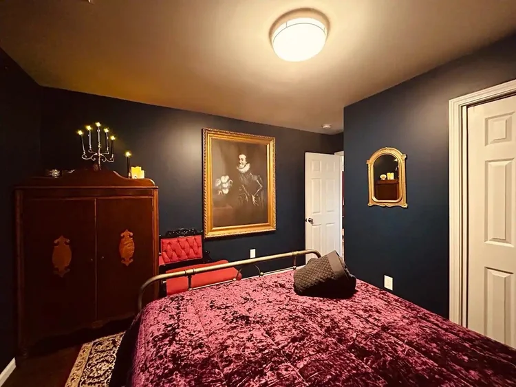 Screen-used Lockwood Mansion painting from The Vampire Diaries. Blue Room of TVD-themed airbnb Hideaway at Mystic Falls. Covington, Georgia. 1864-era photos of Damon Salvatore.