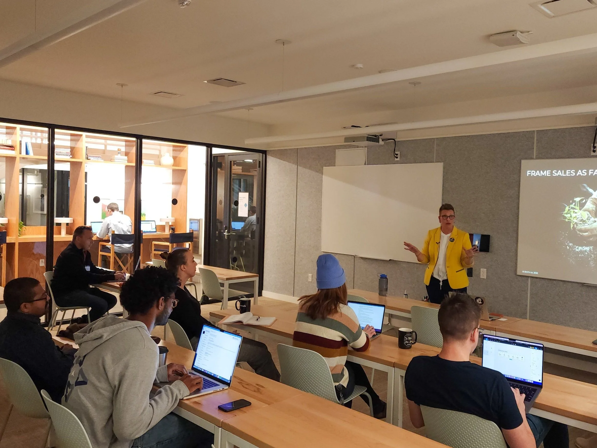 A group of participants learning why introverts makes the best salespeople from Lisa Smith, a sales coach and sales consultant.