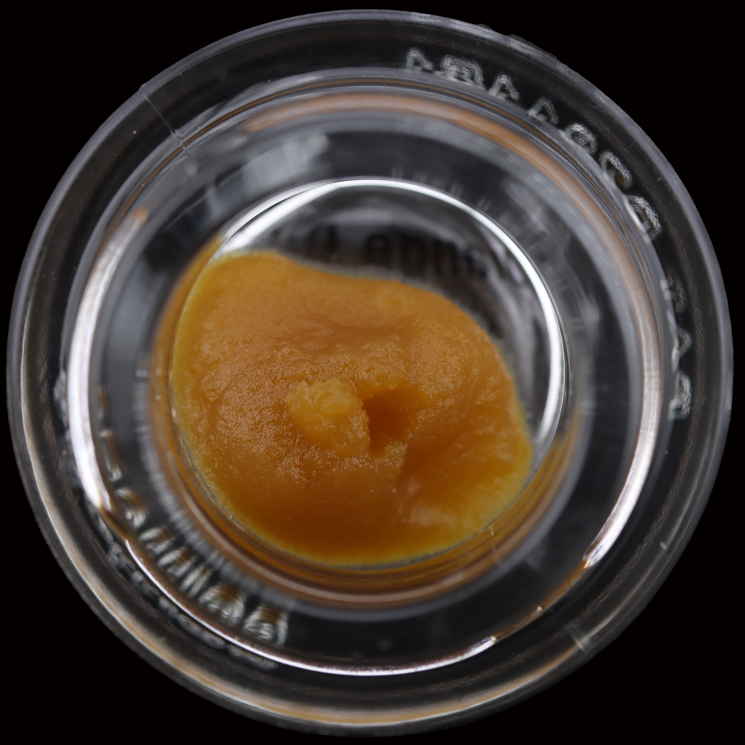 Orange-drizzle-live-resin-badder-by-evermore-packaged-jar