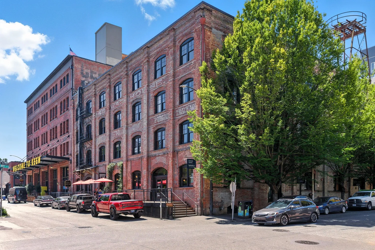 Red-brick facade of the historic Gadsby Building on a sunny day