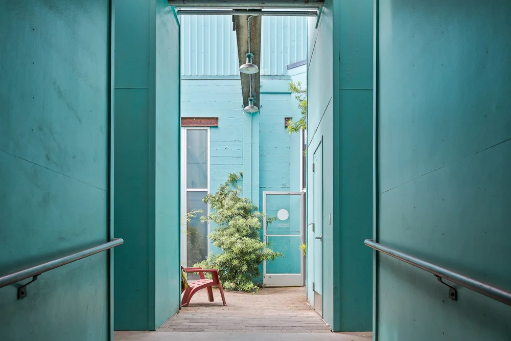Covered passage leading from the street into the courtyard