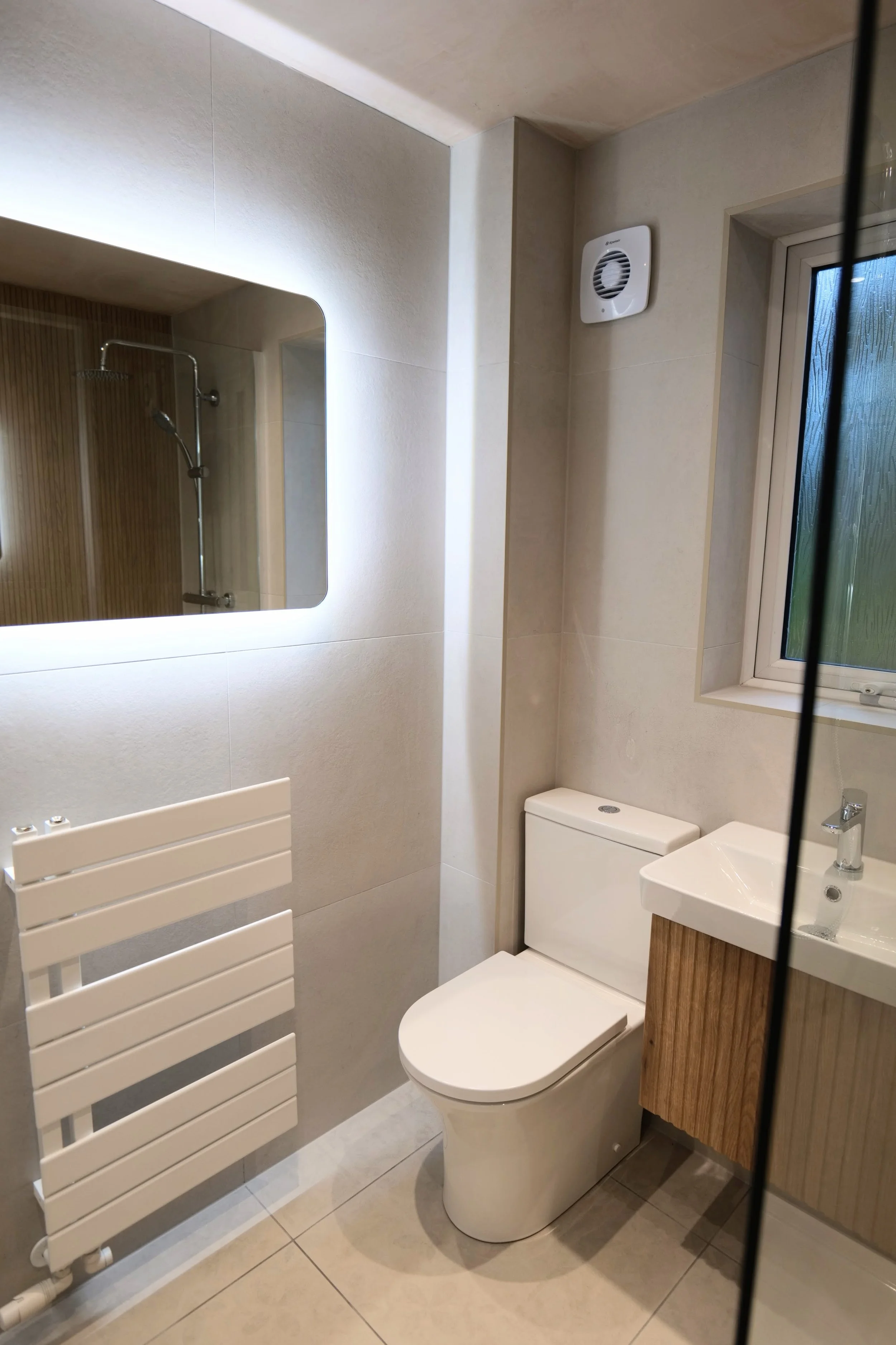 Bathroom Designs by The Tile and Bathroom Company