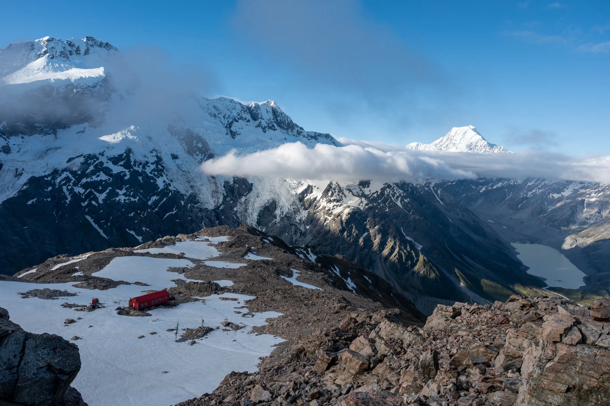 View from Mount Ollivier. Mueller Hut below with Mount Sefton above and Aoraki/Mount Cook at the back. 