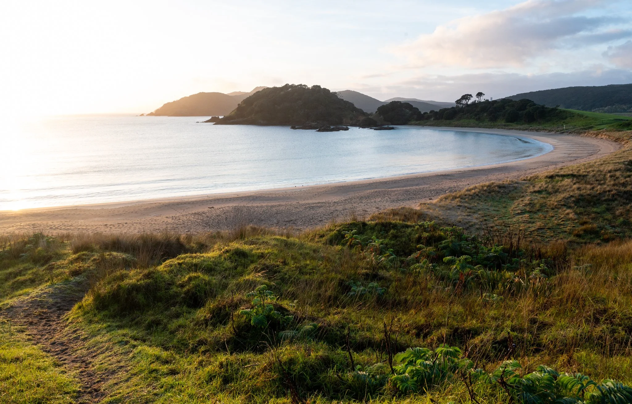 Sunrise over Maitai Bay Campsite. 