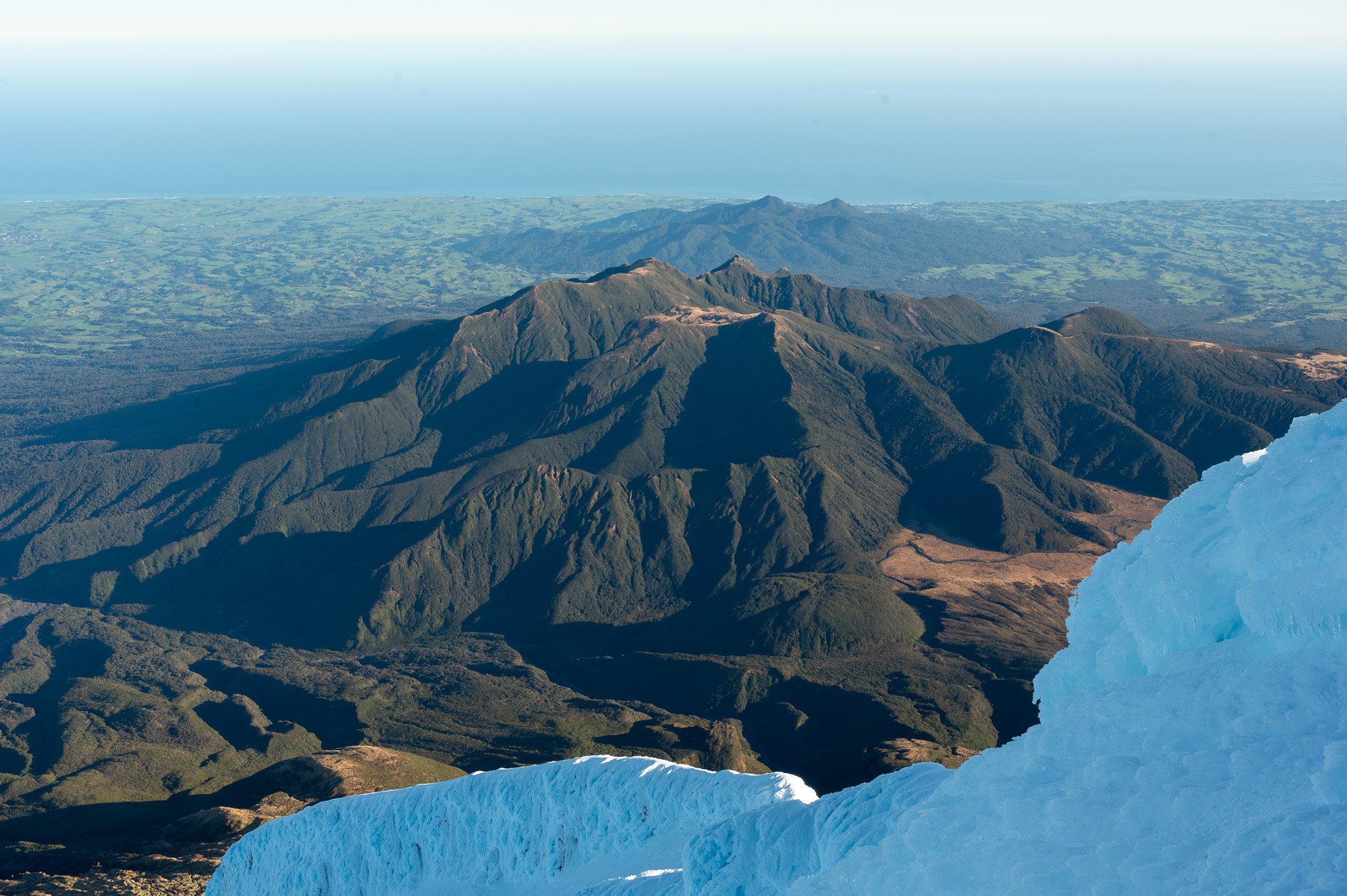 Pouākai Range and Tasman Sea from the top of Taranaki Maunga. 