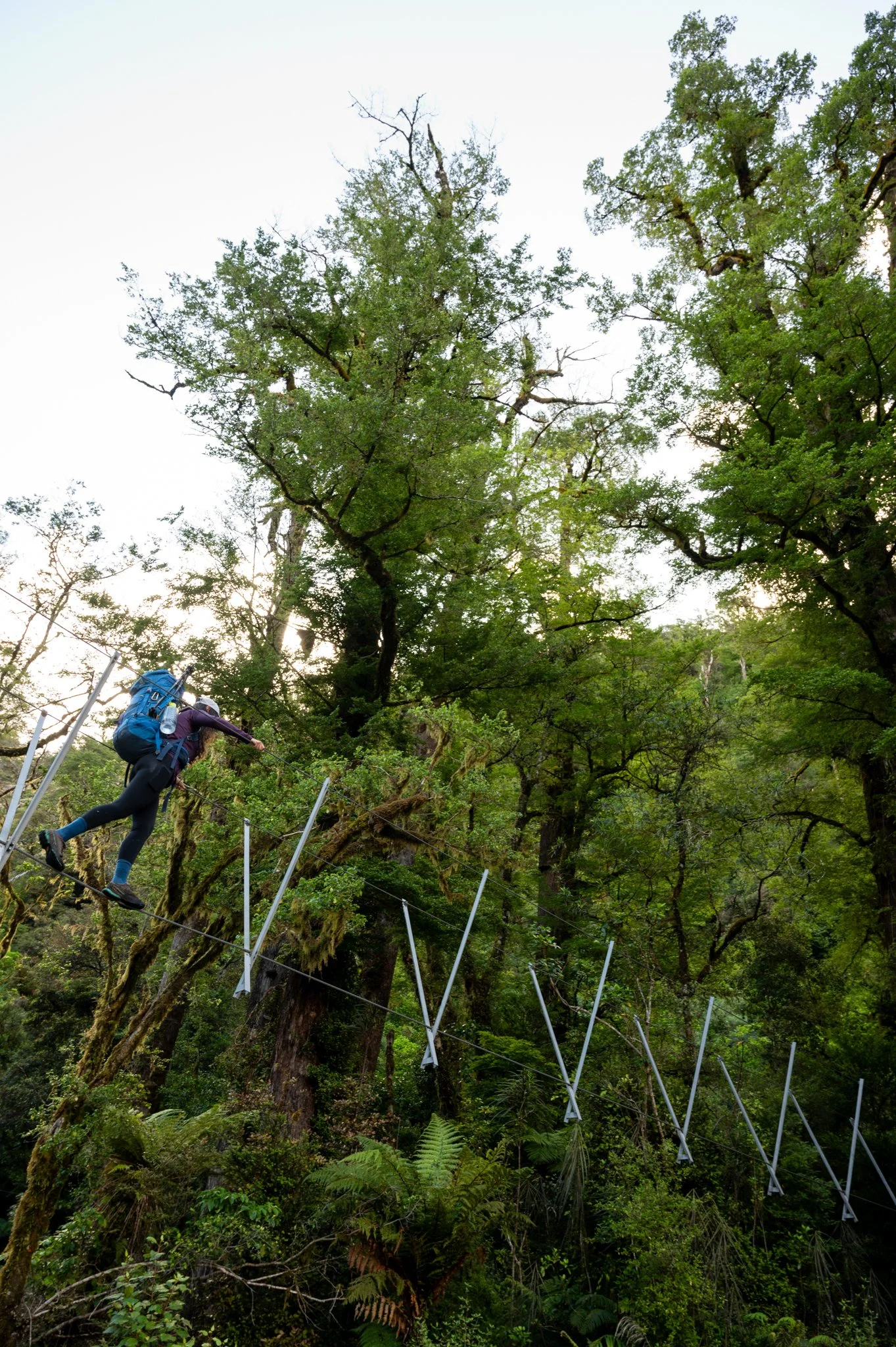 Crossing a three-wire bridge on our way Lake Adeleide. 