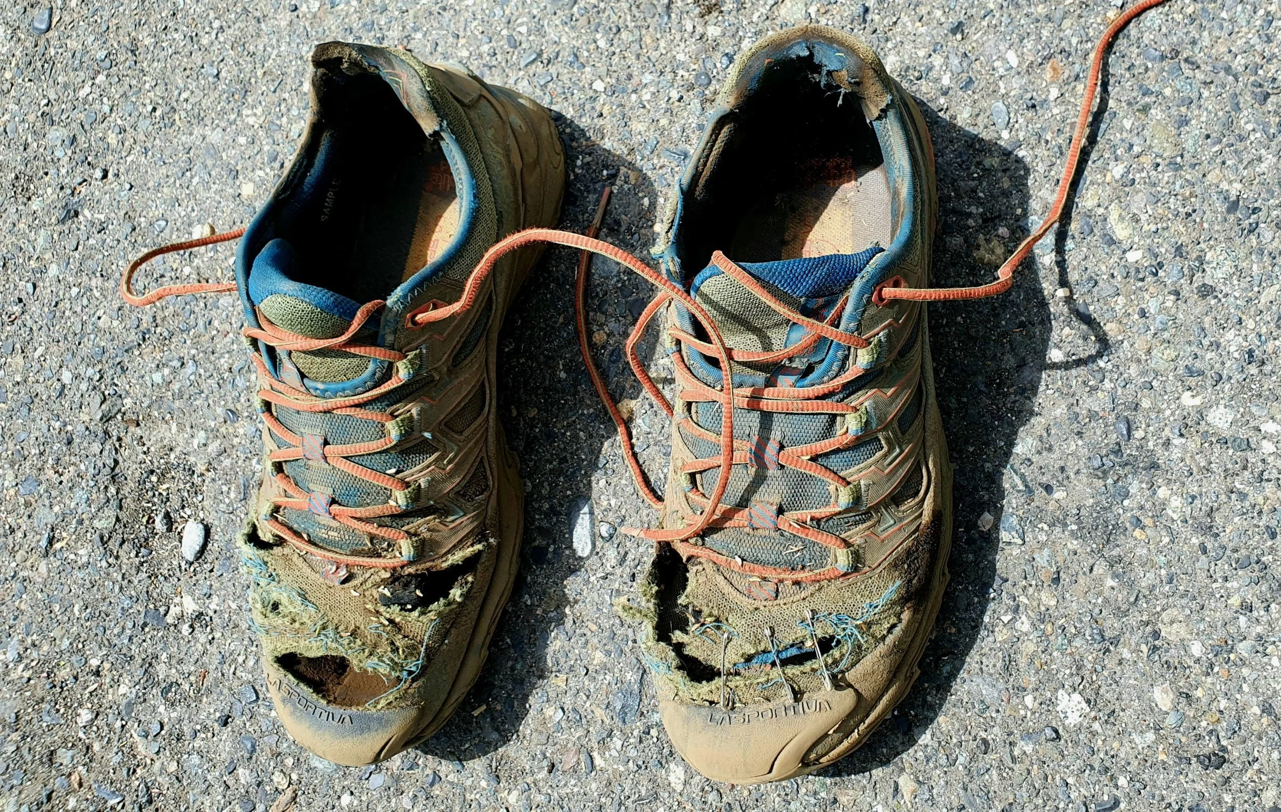 Just a memorial photograph, but it’s time to bid farewell to my little Frankenstein monsters. After gluing, taping, sewing, and stamping them together repeatedly, my La Sportiva Ultra Raptor shoes are ready to be retired after just 600 kilometers. No