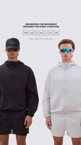 Two male models wearing sportswear; the model on the left is in black with a cap and sunglasses, the model on the right is in white with sunglasses. Text above indicates size options from XXS to XXL and states the clothing is engineered for movement and designed for every condition.