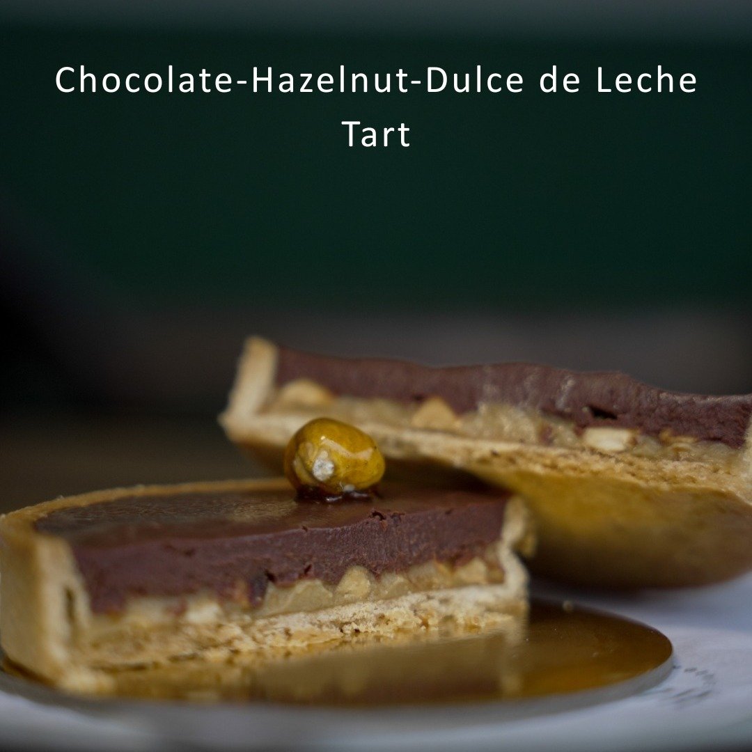 Because Easter isn't just about the hot cross buns. 
We have have this delicious Choc-Hazelnut-Dulce de Leche tart waiting for you this weekend !
You're welcome