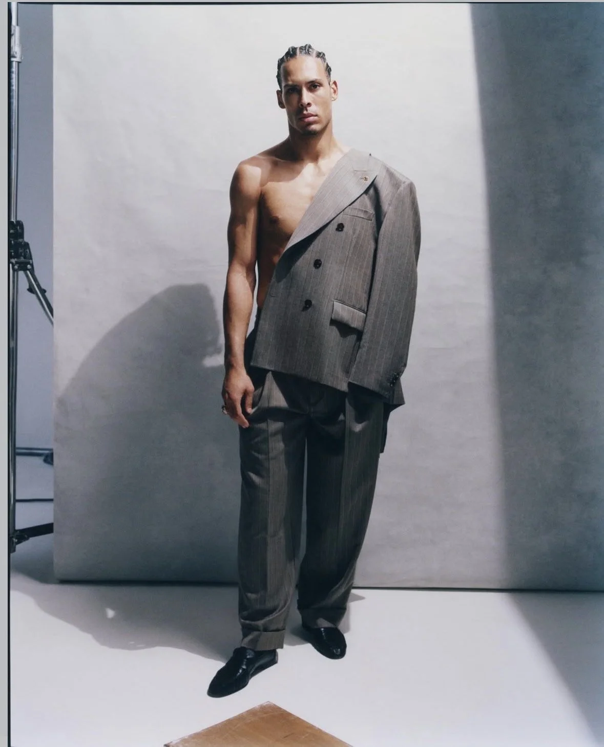 Vogue photoshoot using Hollins Backdrops grey hand painted canvas backdrop. Available to hire throughout the UK via our Manchester studio.