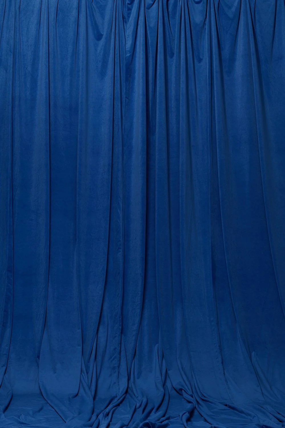 Blue Velvet Drape photography backdrop for hire from Manchester based Hollins Backdrops.