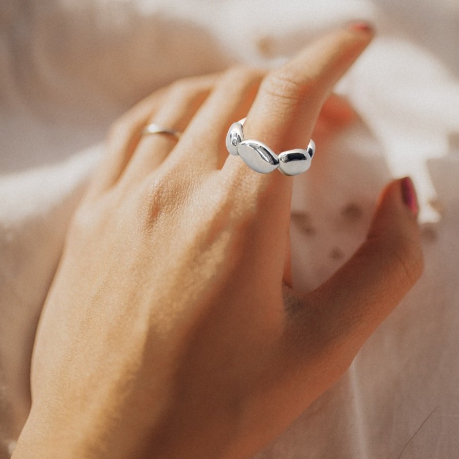 Adelie+pebble+large+on+finger.jpg