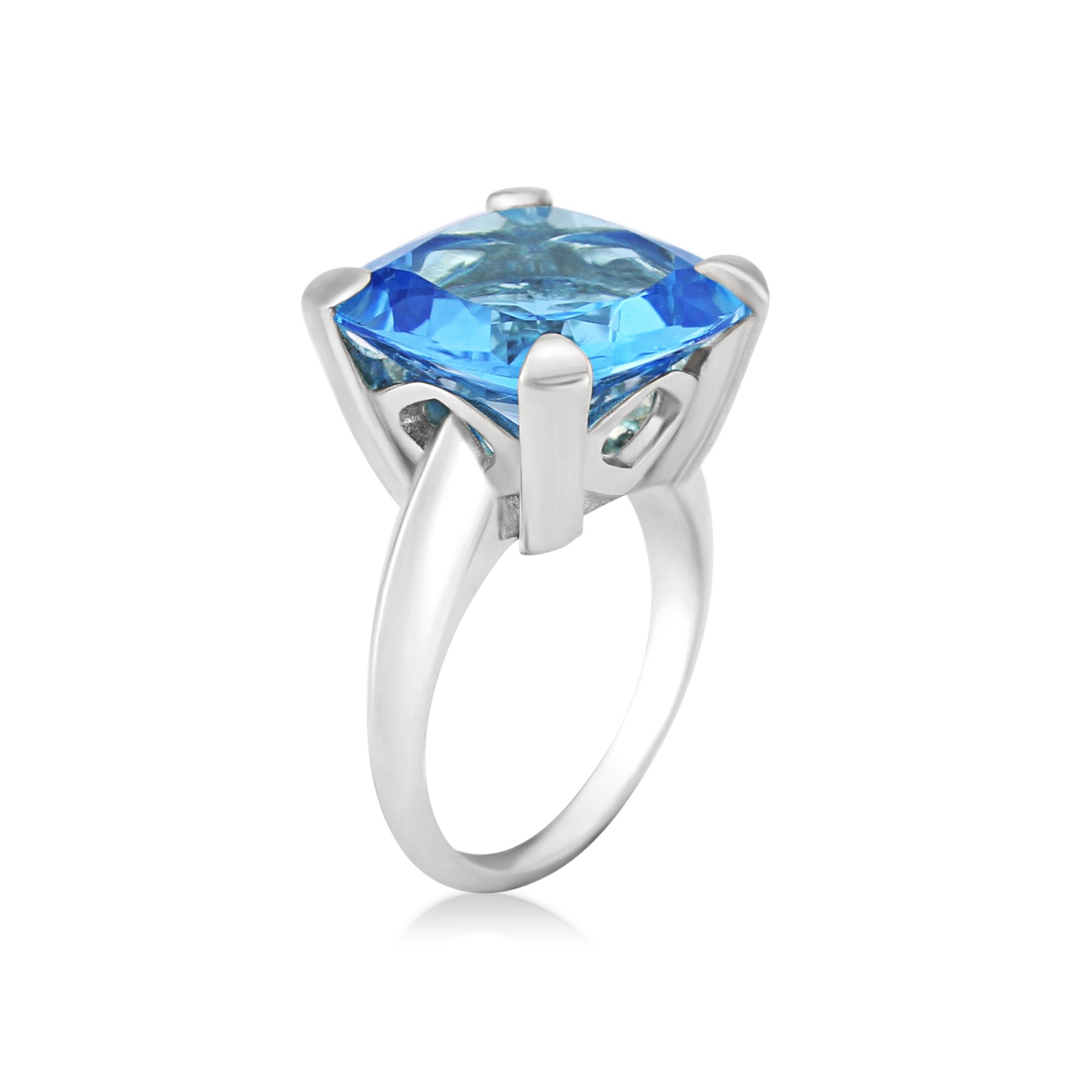 Topaz cushion cut, four claw setting, bespoke collet, silver ring.
