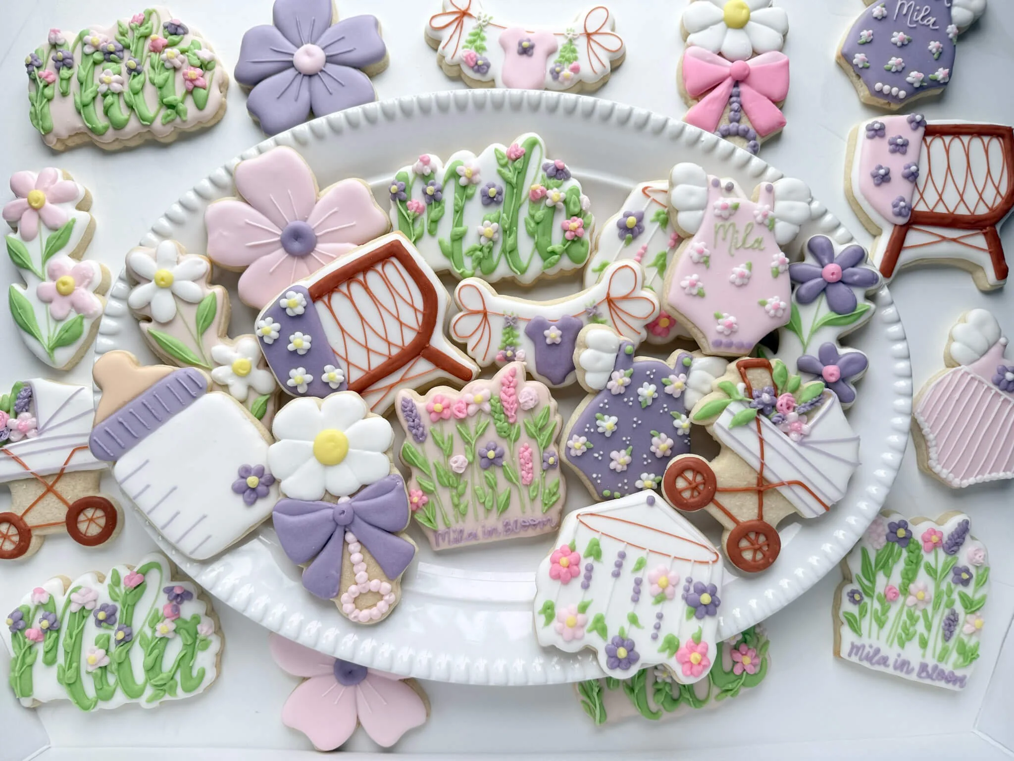 Beautifully detailed floral sugar cookies for a baby in bloom themed shower. Iced RVA brings your event's theme to life with custom edible art in the Mechanicsville area.