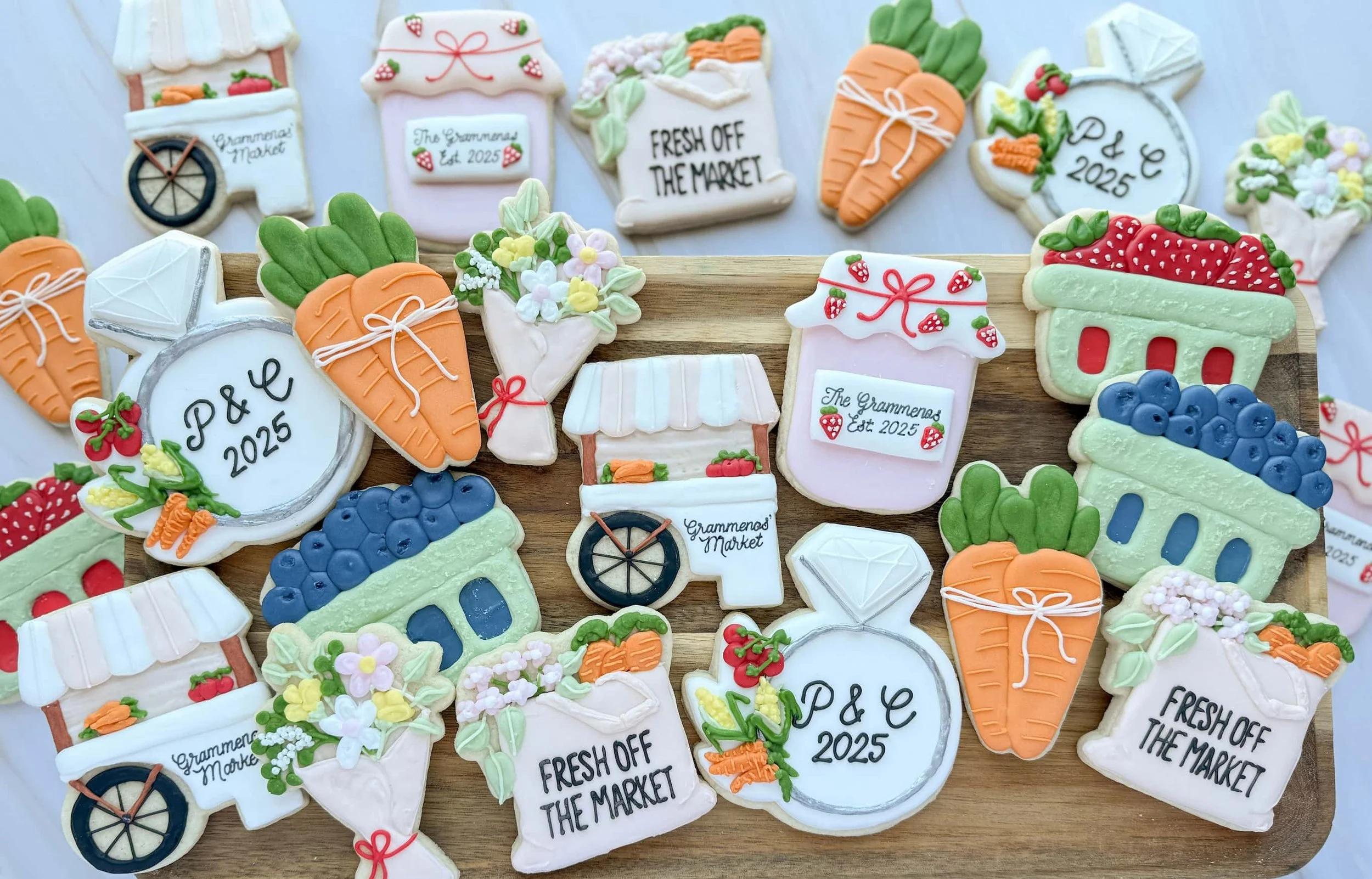 A beautiful set of Fresh off the Market custom decorated sugar cookies, perfect for a farmers market themed engagement party, made by local Mechanicsville bakery, Iced RVA.