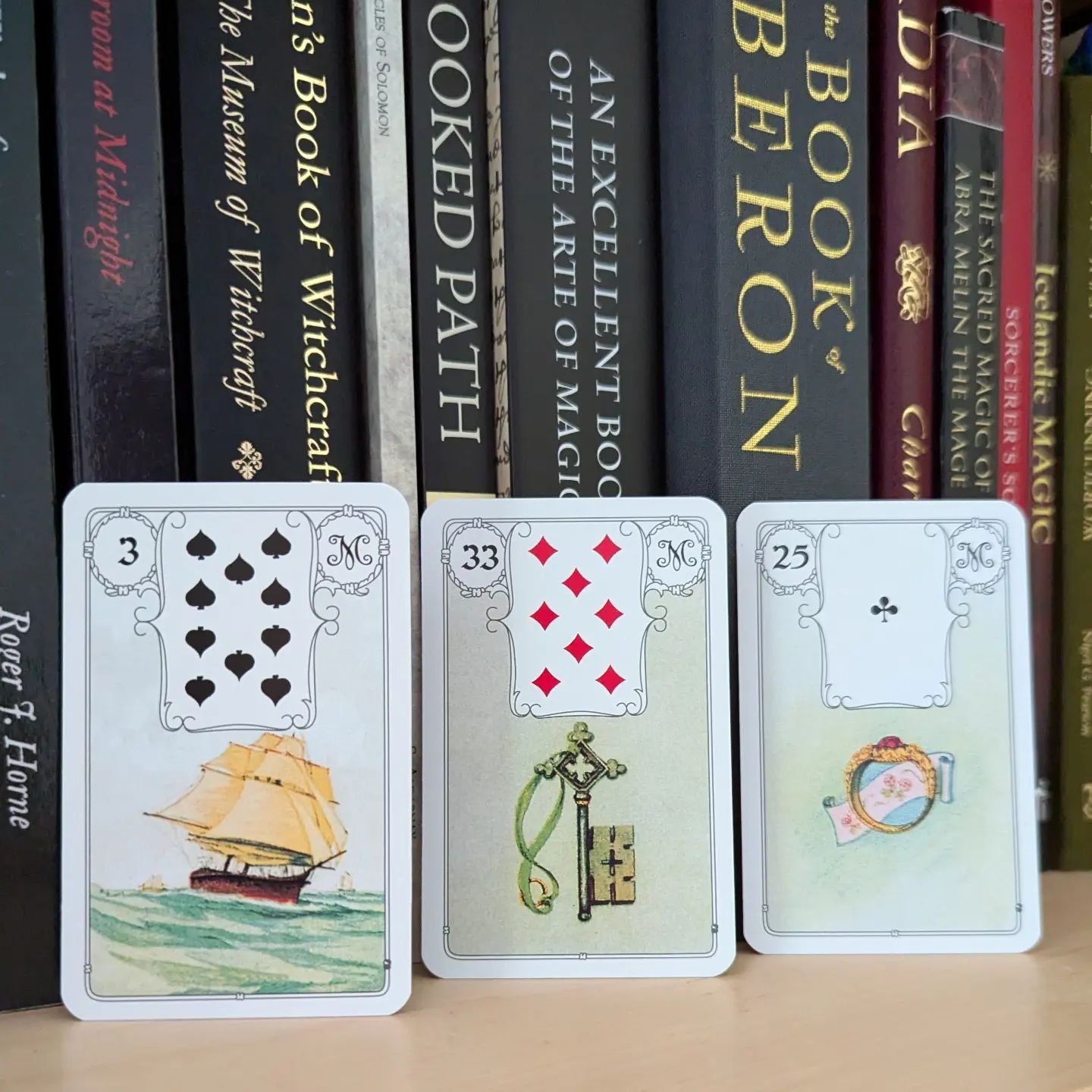 Today's Lenormand reading promises a kind of revelation: you'll embark on a journey or take some kind of step, that unlocks or opens the way. The way to what exactly? To a promise, pact, or greater level of commitment. There is perhaps an element of 