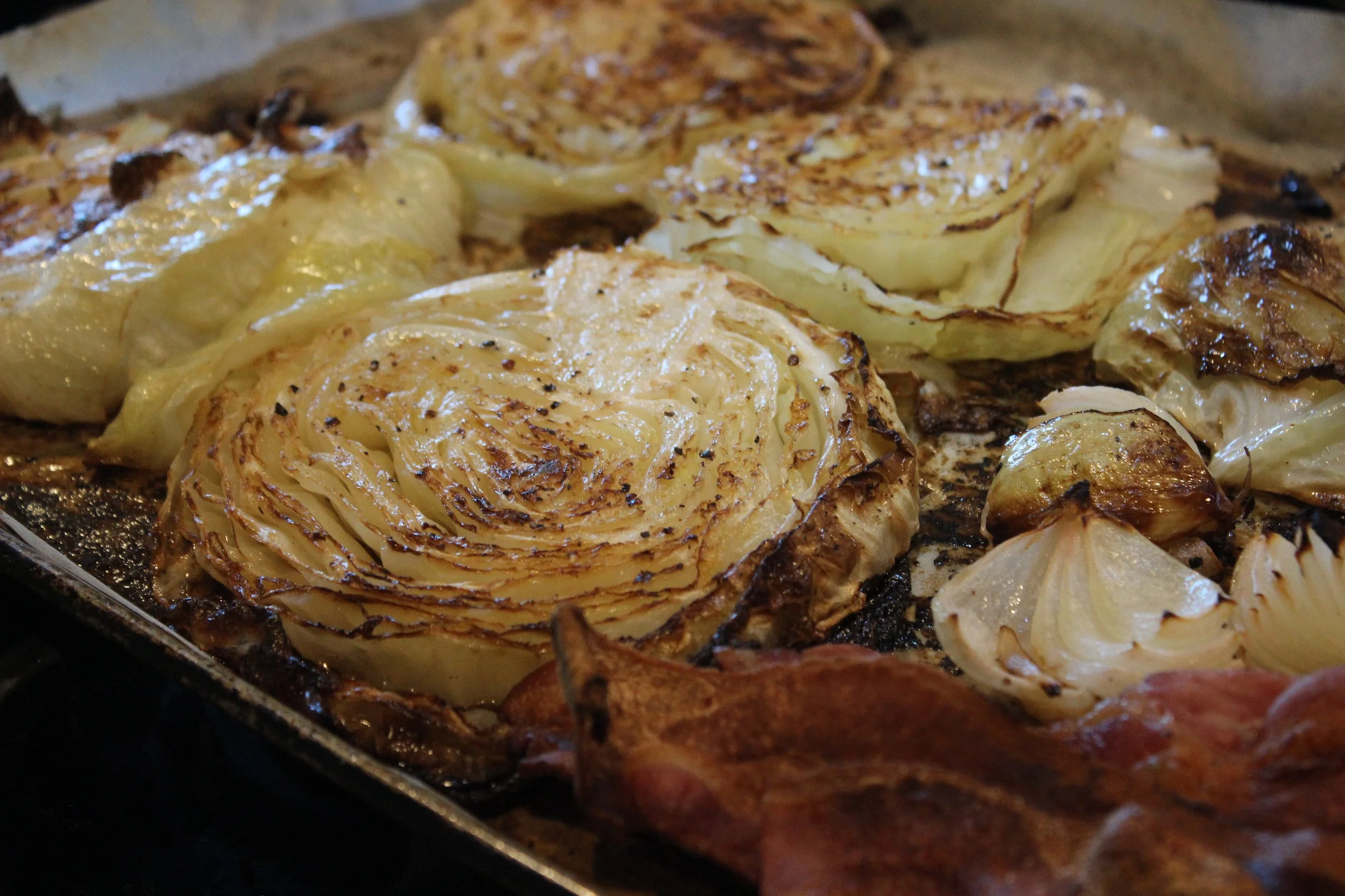 Oven Roasted Cabbage Steaks with Bacon and Onion