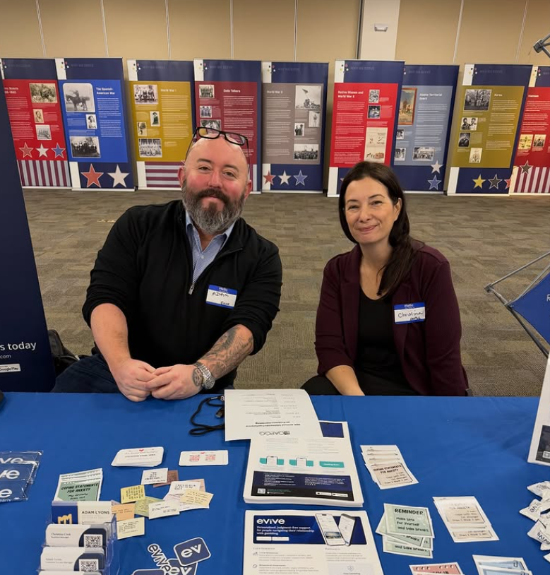 Adam and Christina at 2026 conference Evive table.png