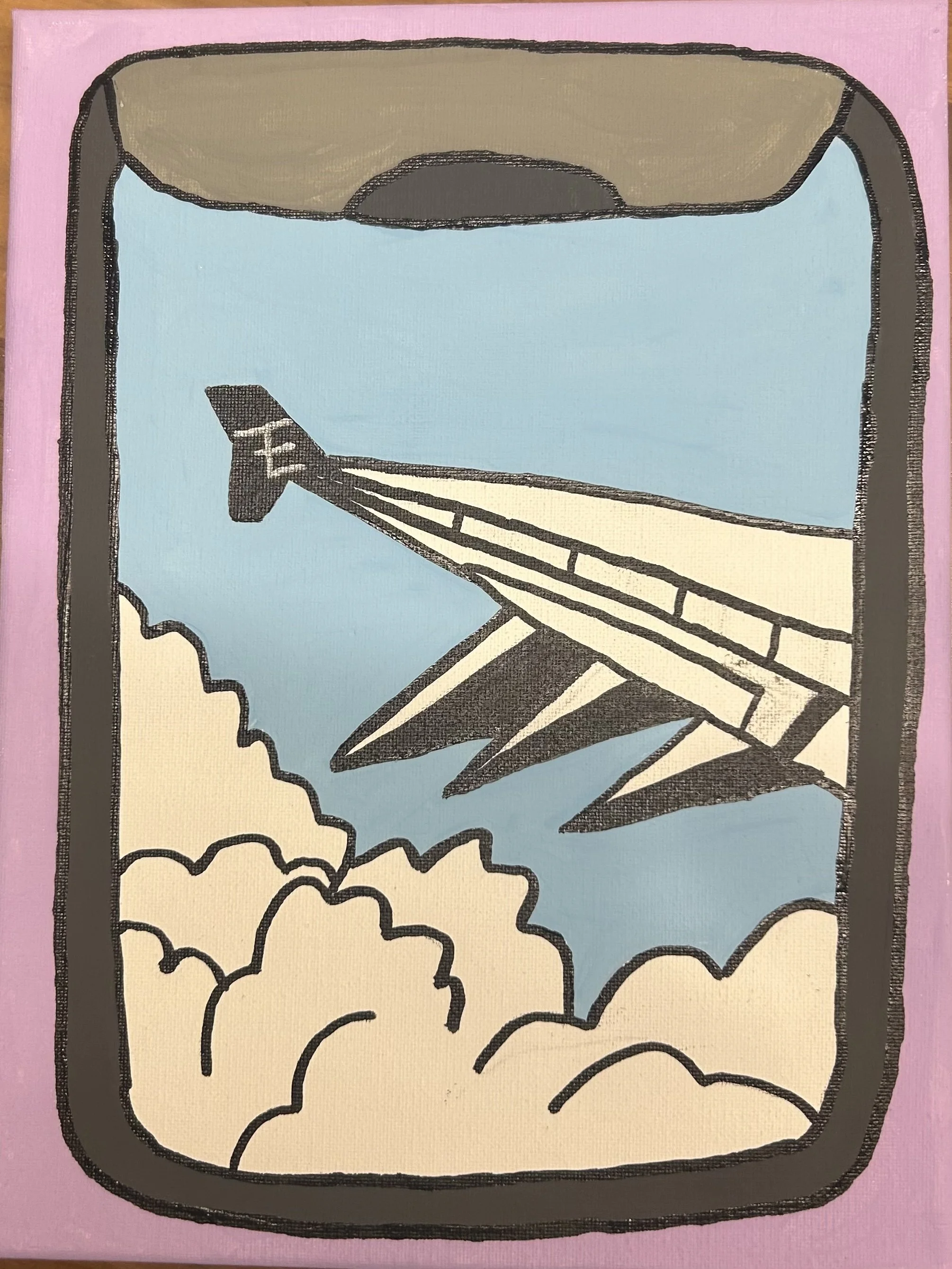 airplane window with view of plane wing and clouds