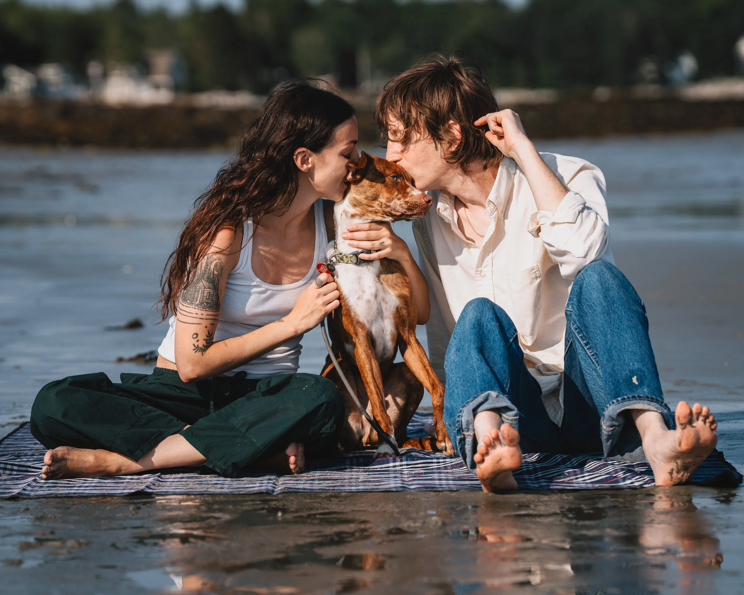 Beso getting kisses from Emilie and Greg on Crescent Beach
