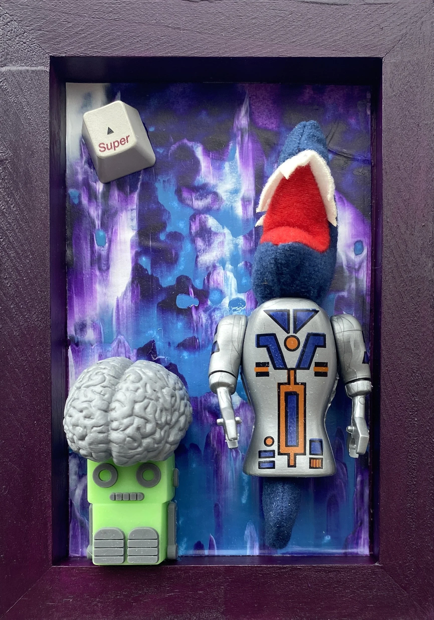 Super Robots, 2025 (5"x7") SOLD, acrylic paint & found objects