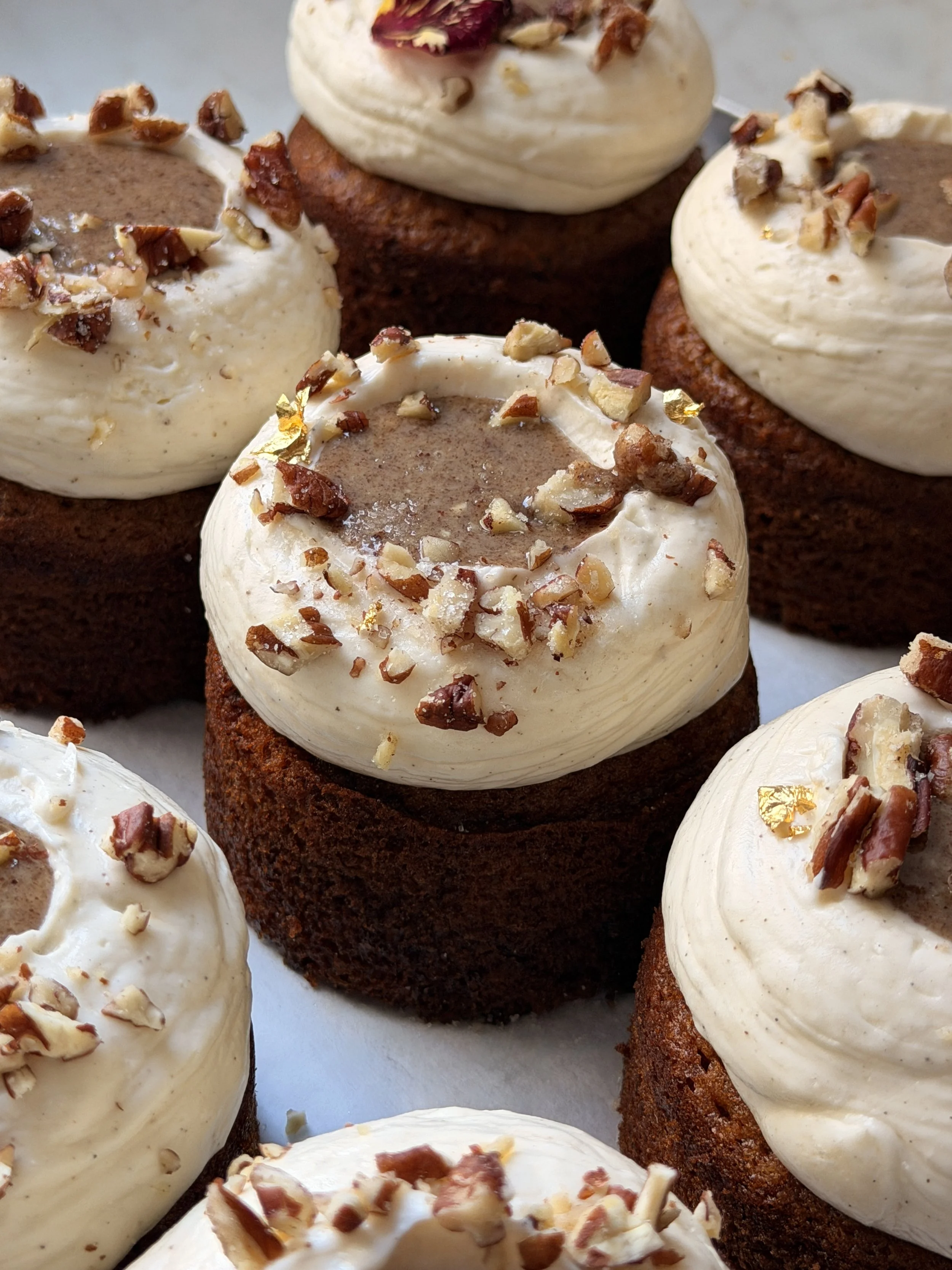 Pumpkin Spice Mini Cakes with Pecan Praliné and Cream Cheese Frosting