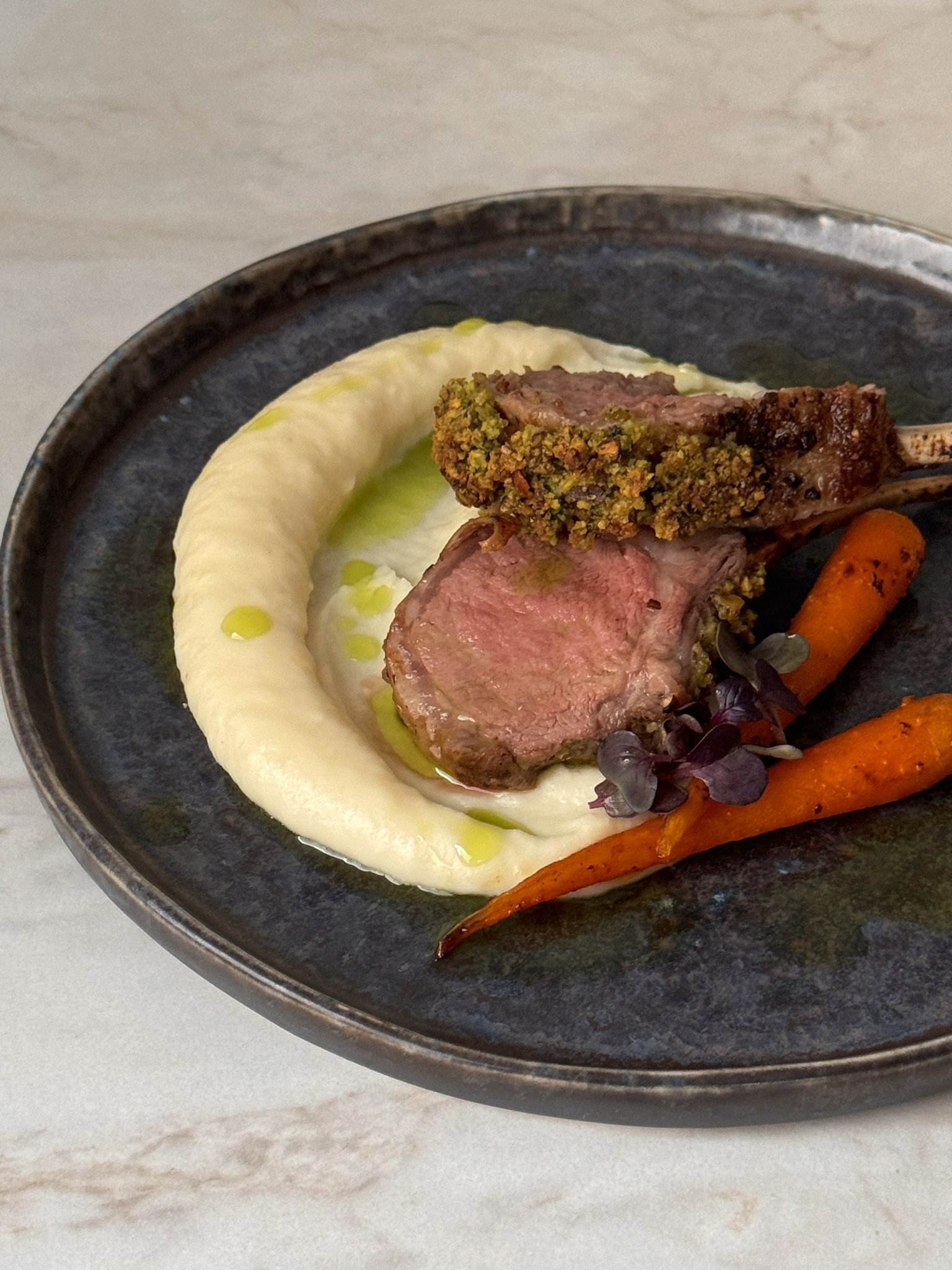 Pistachio-Herb crusted Rack of Lamb with Parsnip Purée and Honey-glazed Baby Carrots