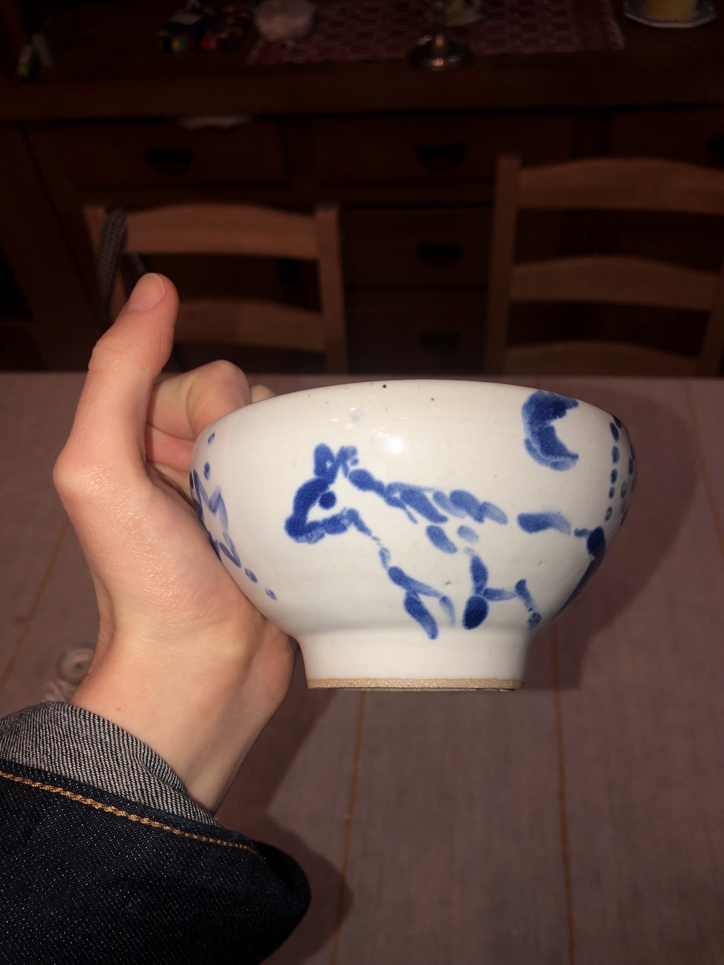 Thrown stoneware bowl with glazes.