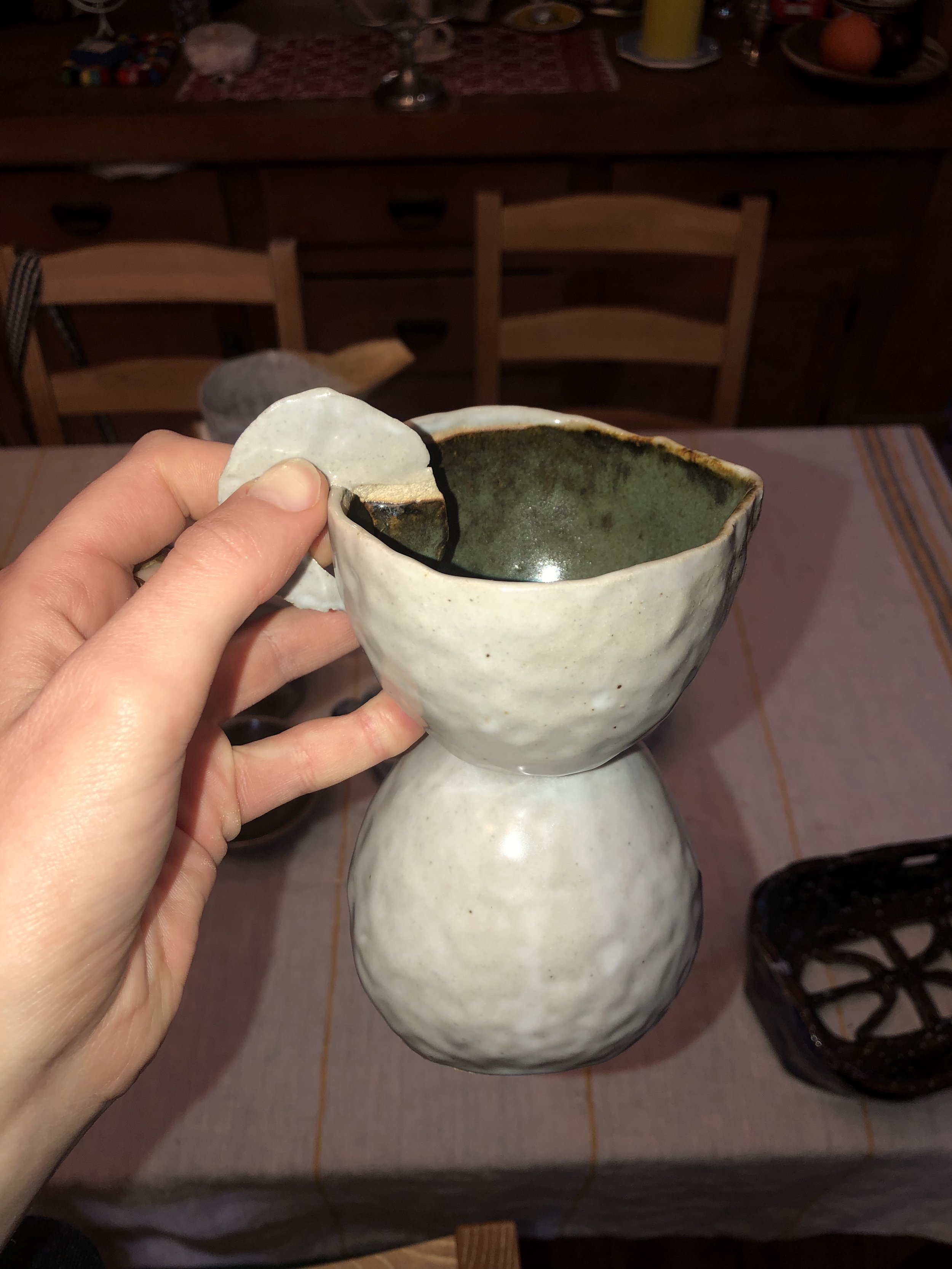 Hand-built stoneware ritual pouring vessel with handle attachment and dual glaze application. 2023.