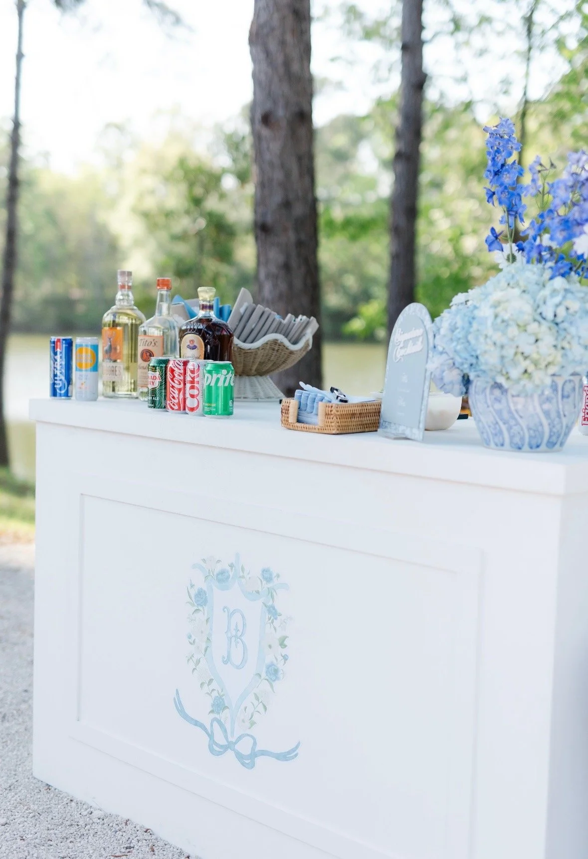 White 5-foot wooden bar display, fully customizable for weddings and events in Savannah, GA and the Southeast.