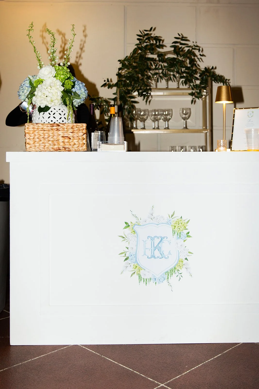 White 5-foot wooden bar display, fully customizable for weddings and events in Savannah, GA and the Southeast.