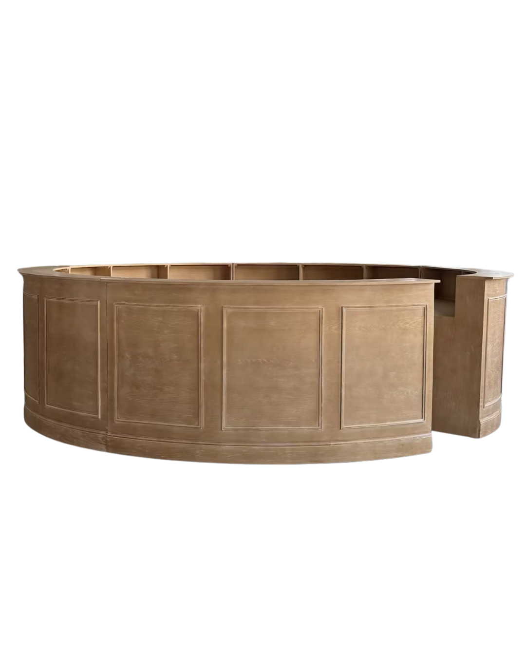 A semi-circular wooden reception desk with paneled front and a high counter surface.