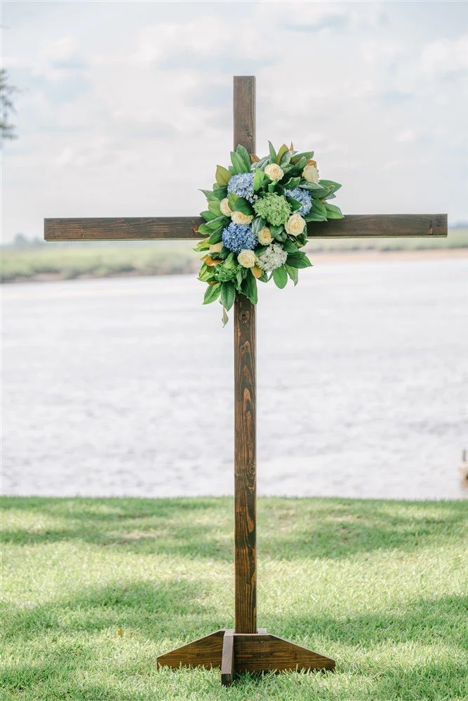 A rustic Wooden Cross available for wedding and event rentals in Savannah, GA, the Lowcountry, and beyond.