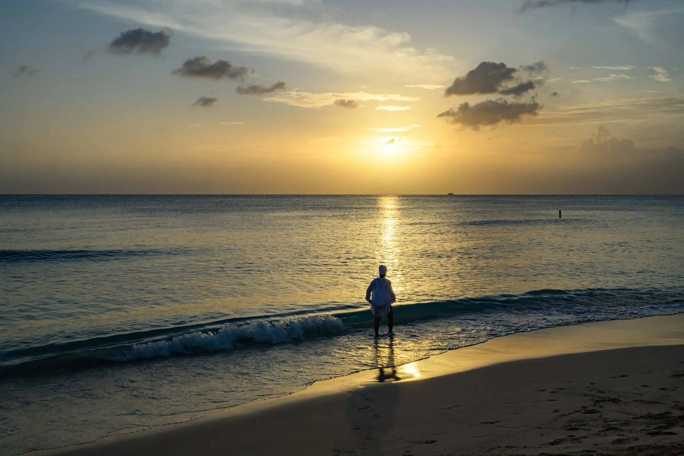 women walking along the beach, reflecting calm and purpose, symbolizing guidance, growth, and connection with nature