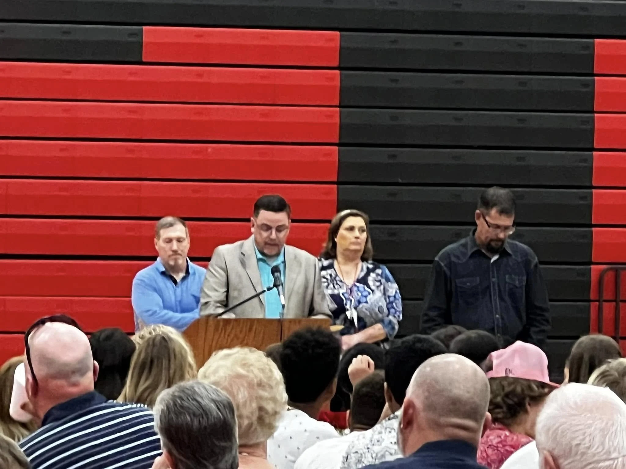 Handing out scholarships at athletic banquet