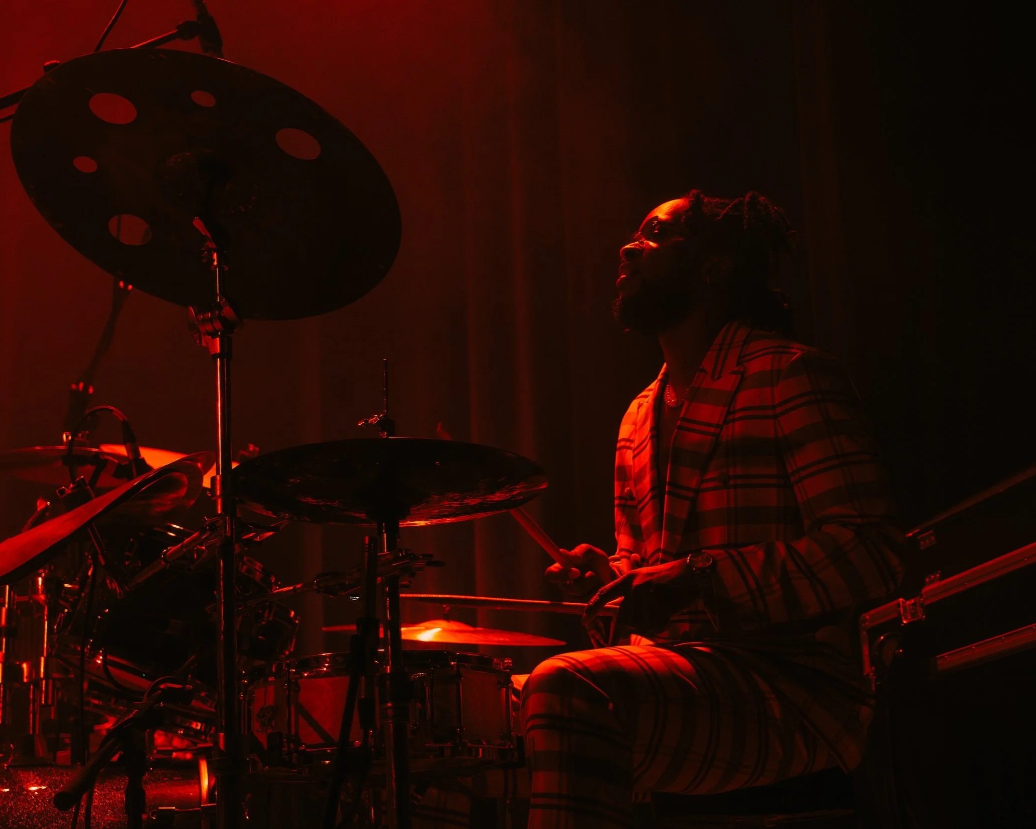 Jon Onabowu playing drums at Venna's headline show at Islington Assembly Hall 2024