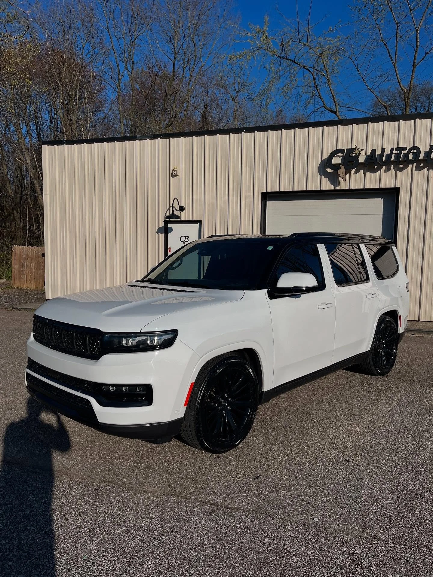 Grand Wagoner in for a full chrome delete and all around window tint