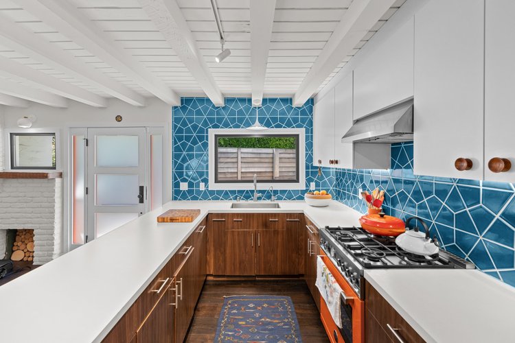 Bright kitchen with blue tile backsplash