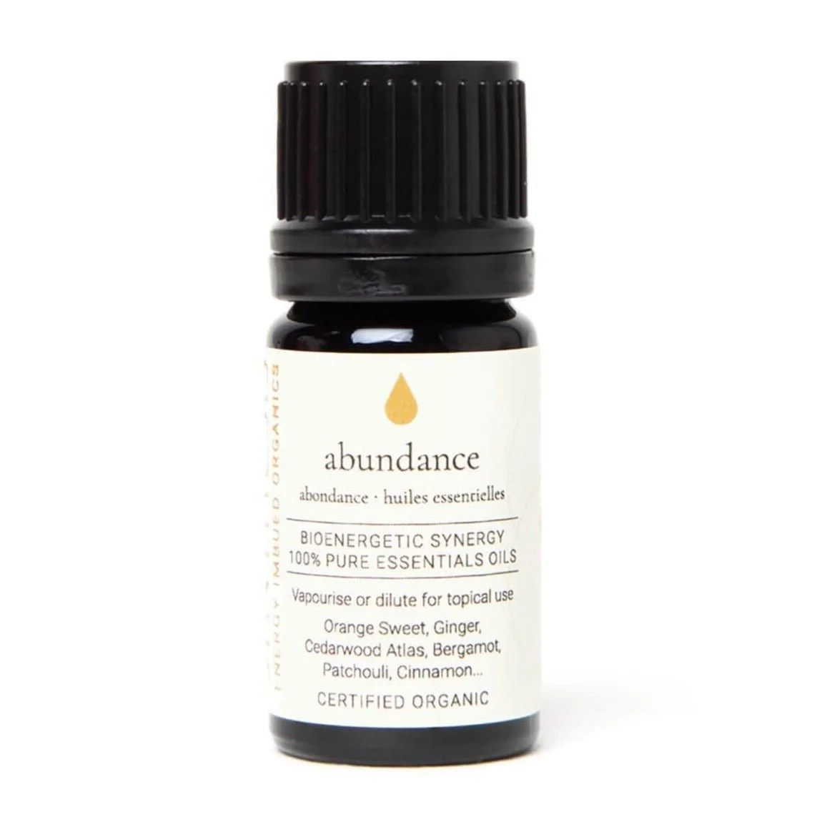 Abundance organic essential oil synergy, dark glass bottle on white