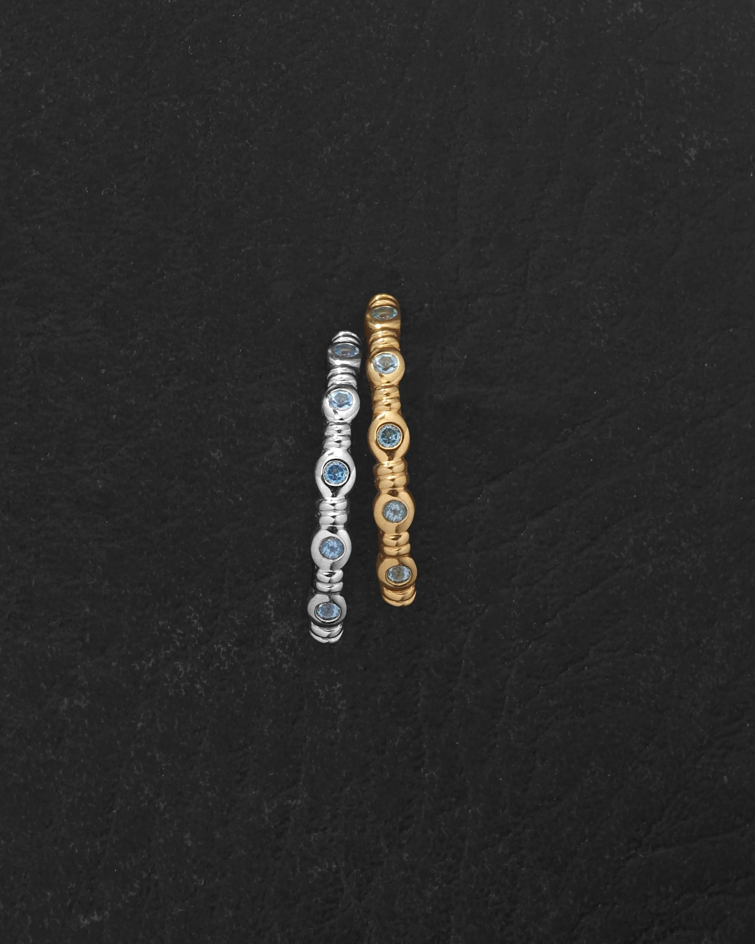 03_Aqua_Band_Ring_Gold_Vermeil_Silver_on_dark_leather.jpg