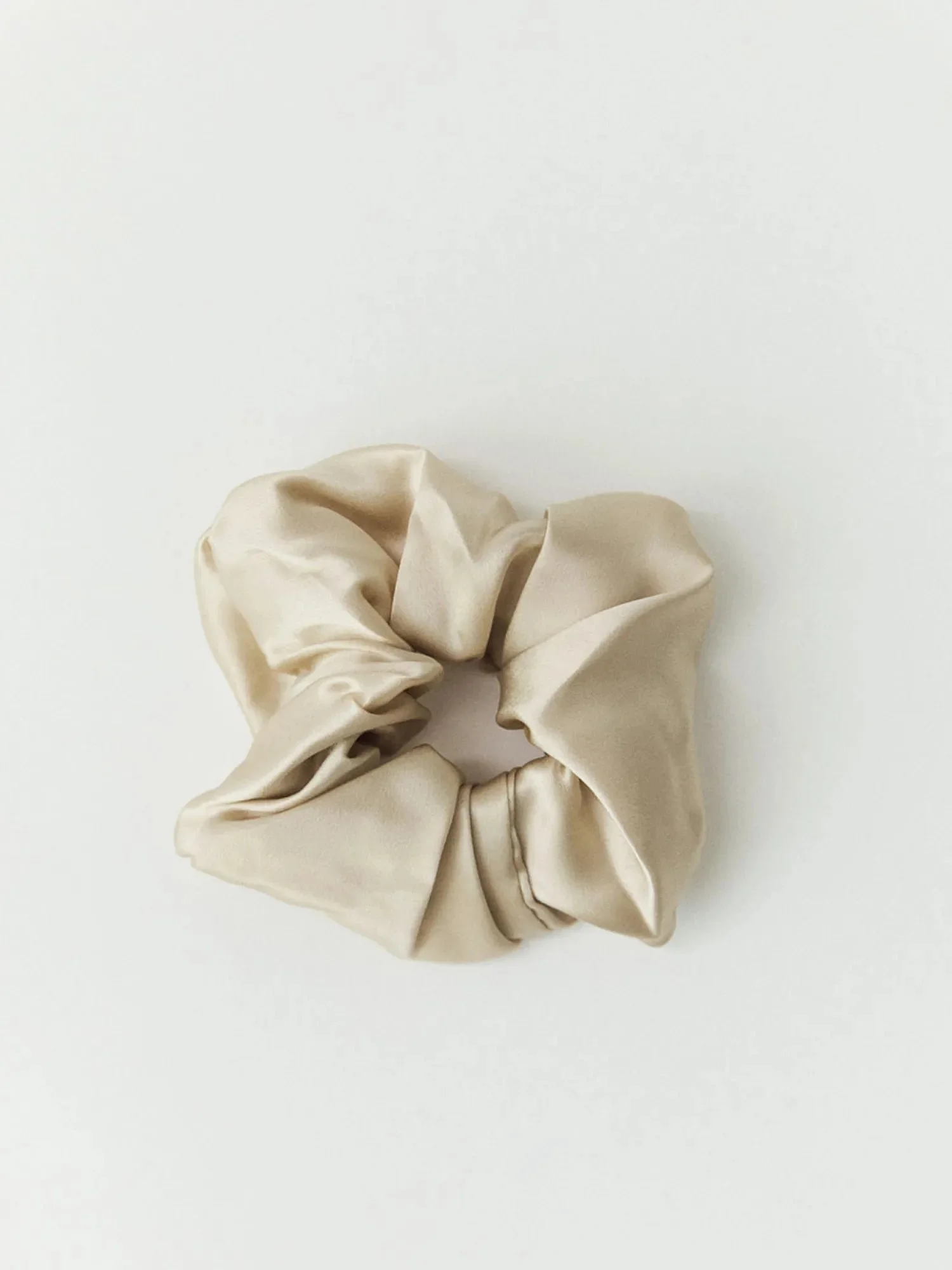 Mulberry silk scrunchie in stone, on white