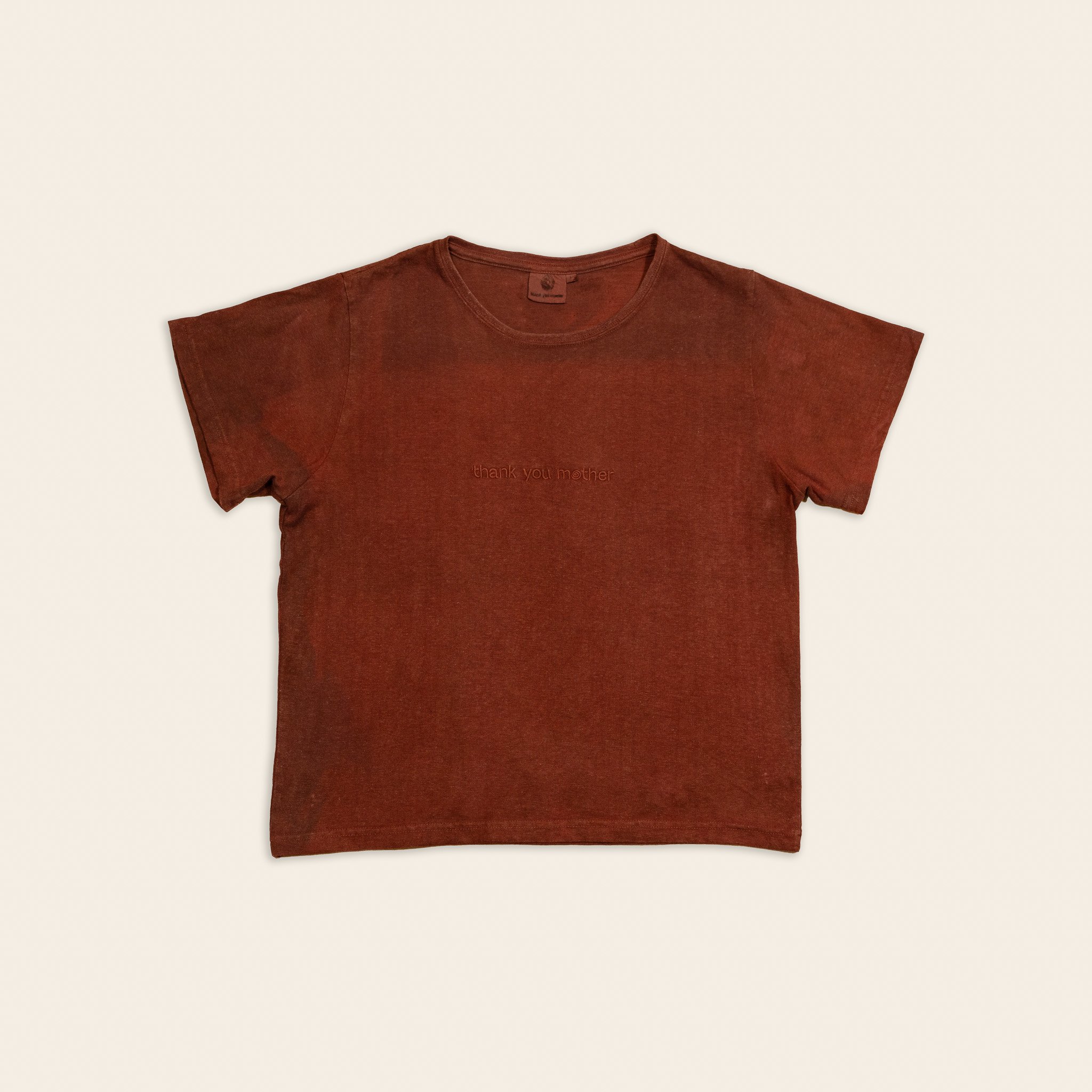 Women's cropped plant dyed hemp tee in madder root, flat lay