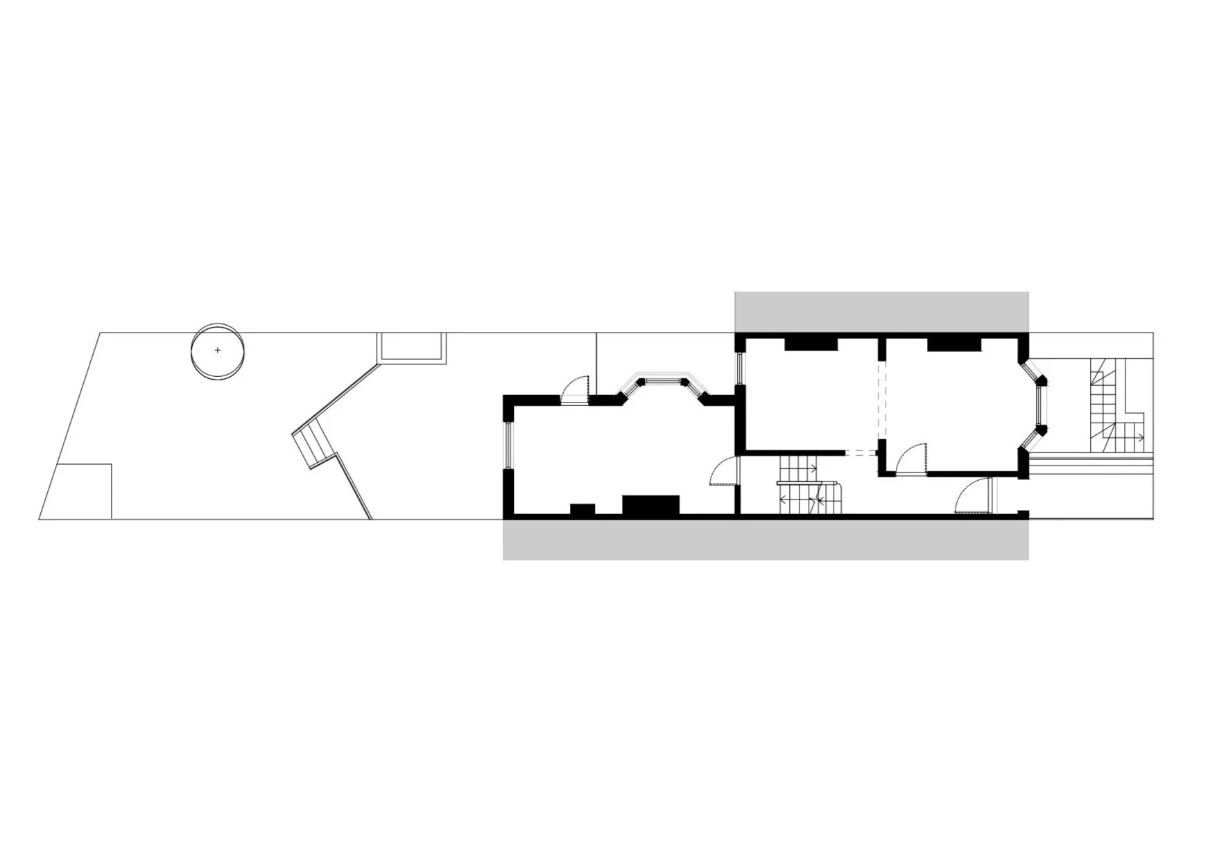 Architectural floor plan of a house with multiple rooms, staircase, and a backyard with a tree and outdoor patio.