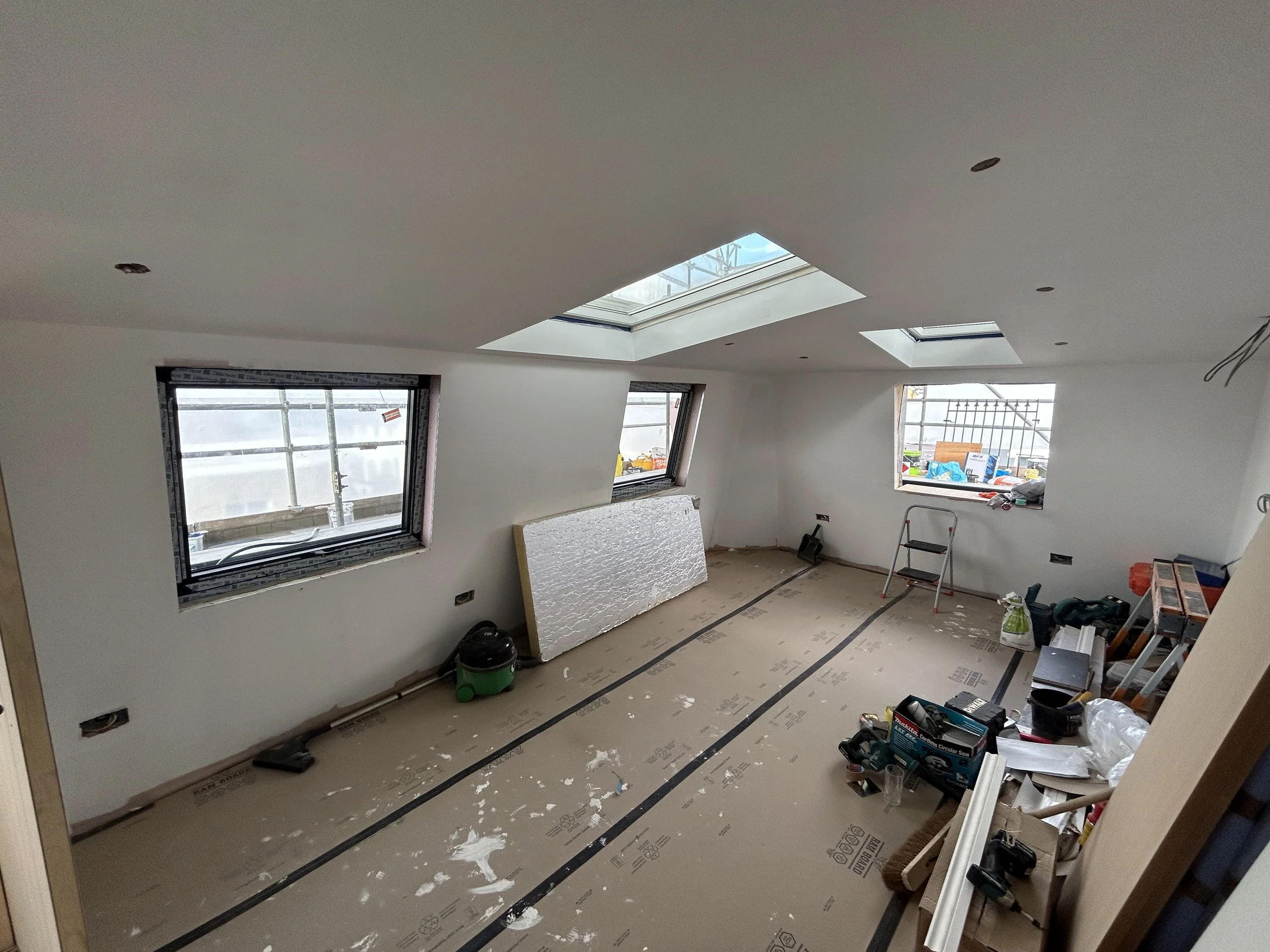 Inside a mansard roof extension in south London. Lots of space in the new bedroom.