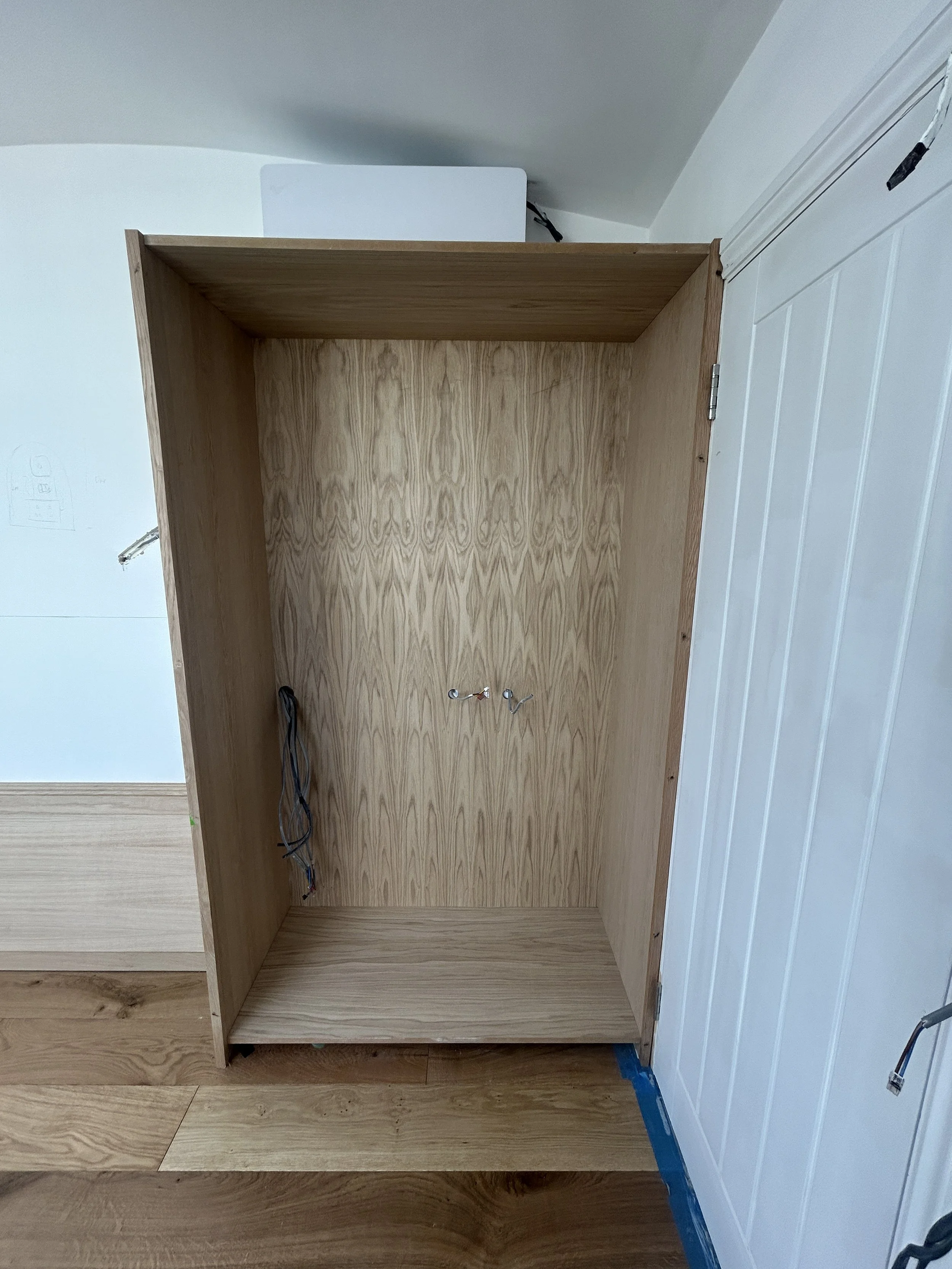 Here you can see the initial frame we built and fixed to the corner for the right-side wardrobe.
