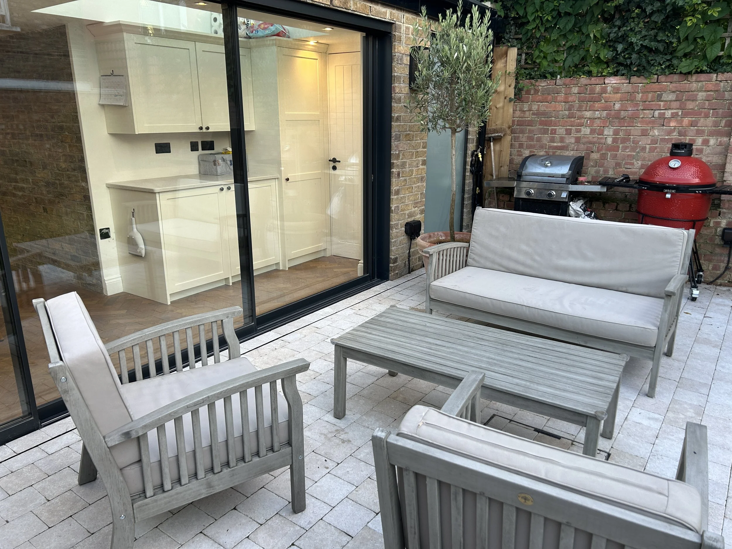 The utility room in the L of the wrap around extension really utilises the space well.