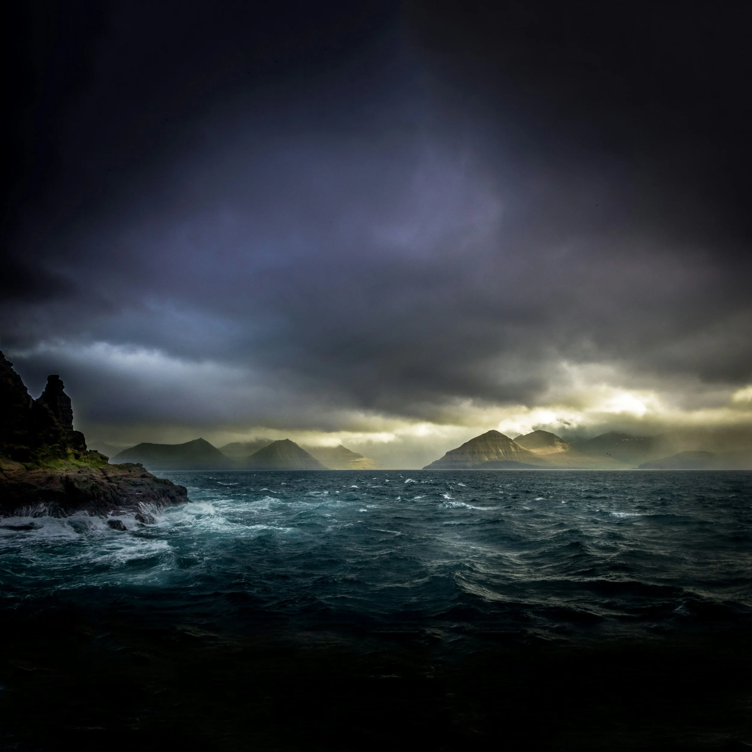 a stormy sky and rough sea