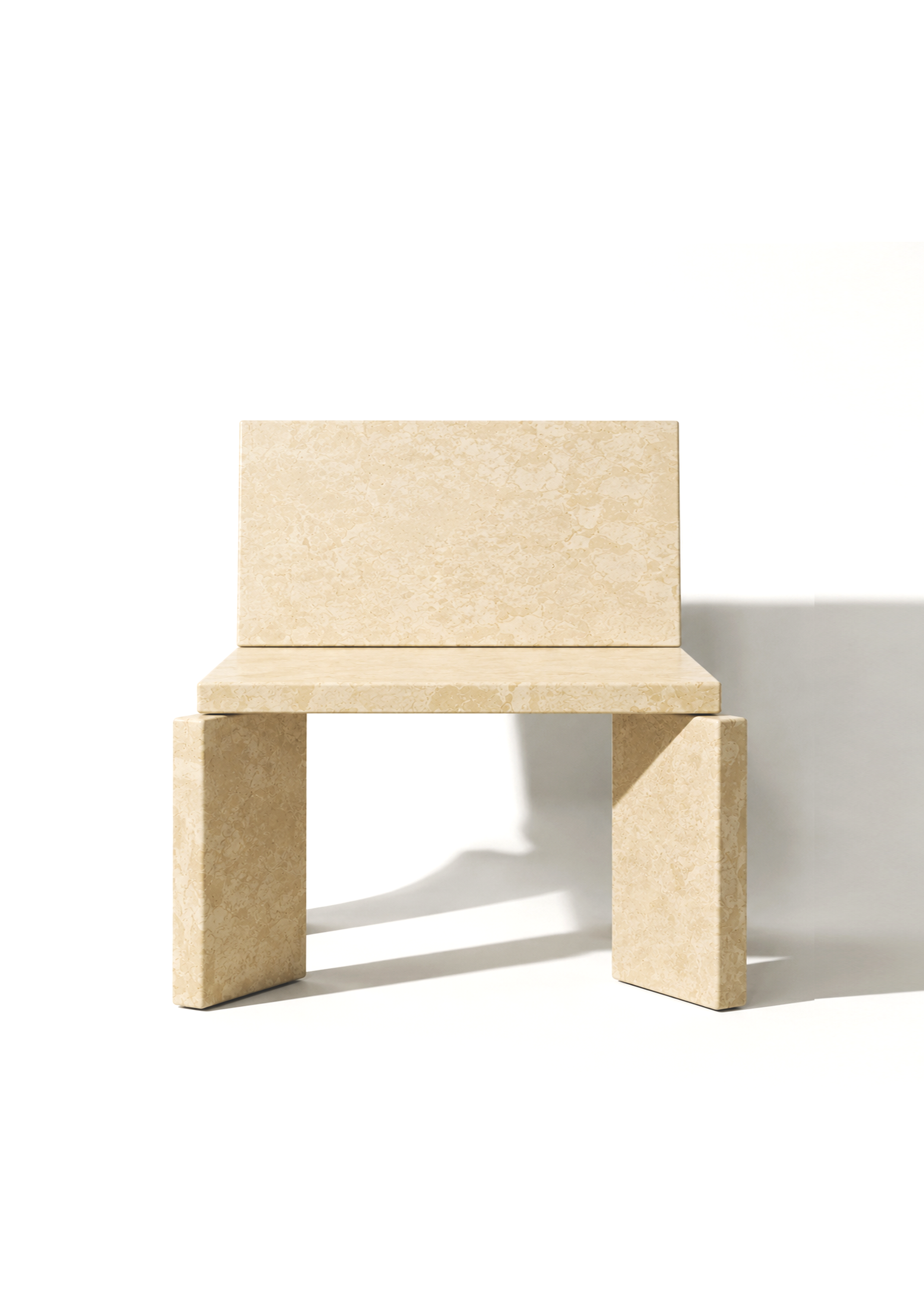 A minimalist beige marble stool with rectangular legs, set against a white background with a shadow cast on the right side.