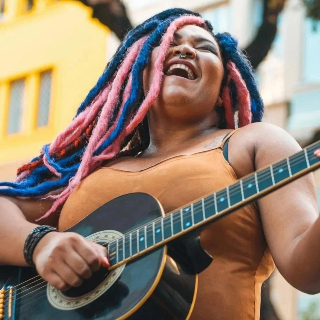 GettyImages-1267230352%252Bwoman%252Bguitar.jpg