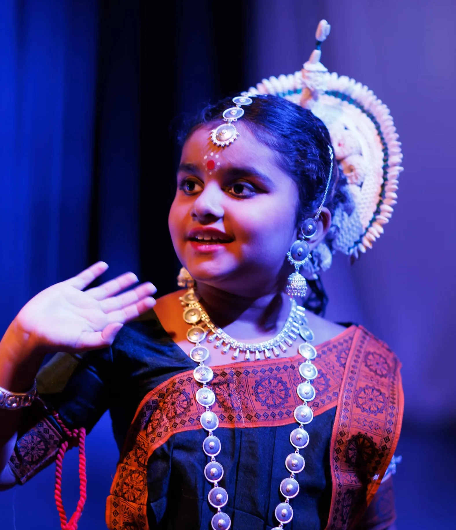 student on stage in performance